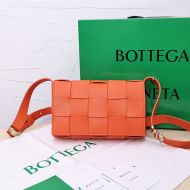 Bottega Veneta Medium Cassette Crossbody Bag Intreccio Grained Calfskin Orange